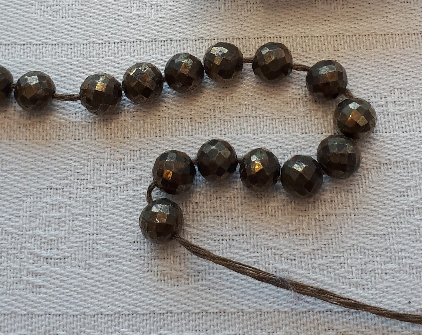 Round Pyrite Faceted beads - 7mm